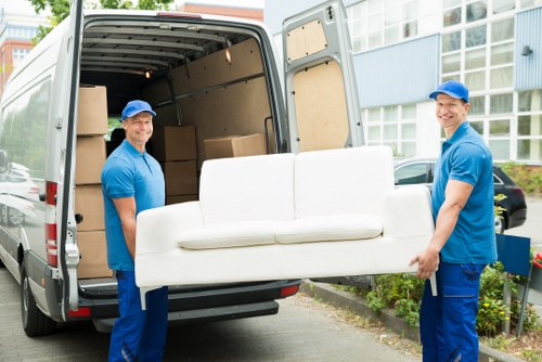 Removal van loading commercial equipment near Shepherds Bush