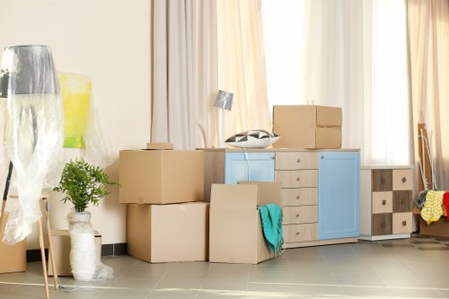 Packed moving boxes ready for house removals in Shepherdsbush