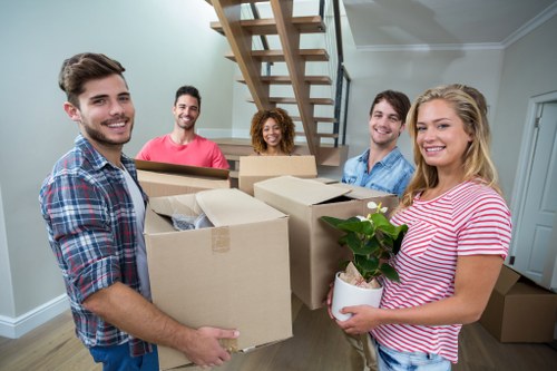 Office removal planning in Shepherdsbush with packed boxes and office furniture