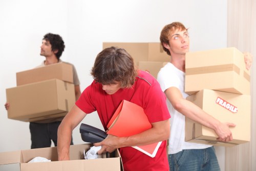 Local removals team transporting items through Shepherdsbush streets