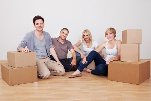 Wrapped sofa and tables prepared for furniture removals in Shepherdsbush