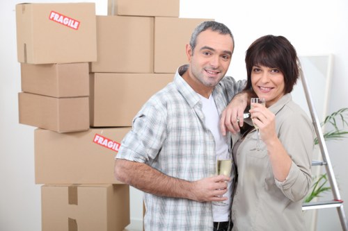 Moving team planning a removal in a busy Shepherds Bush street